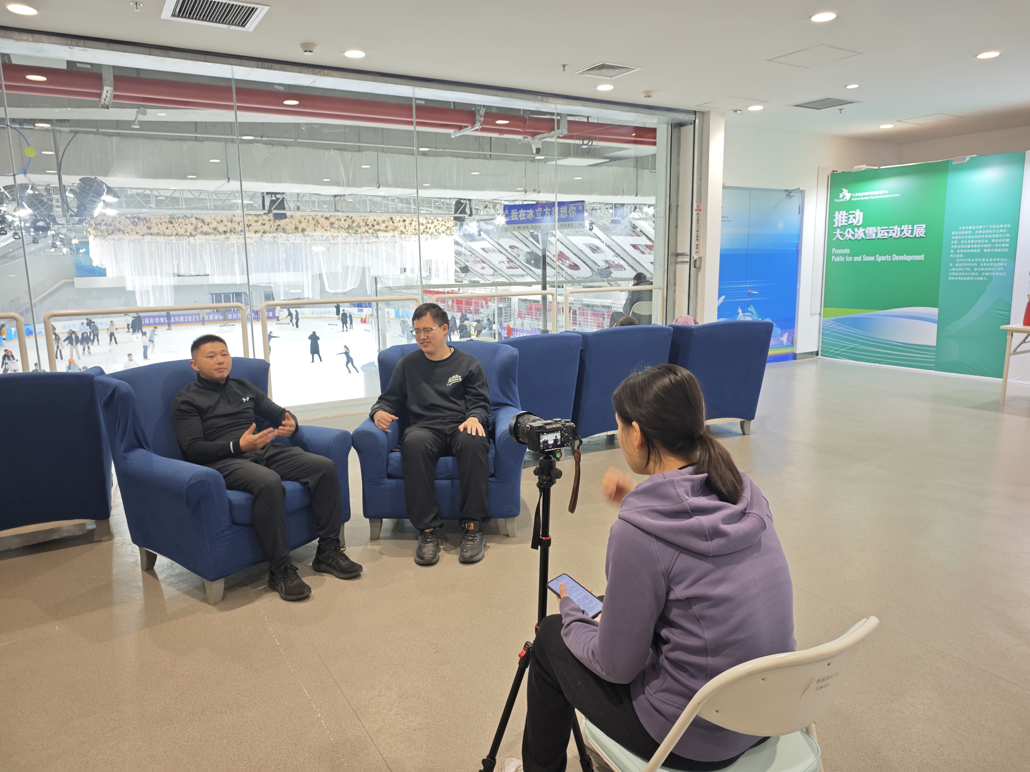 Community organizers speaking during a filmed interview